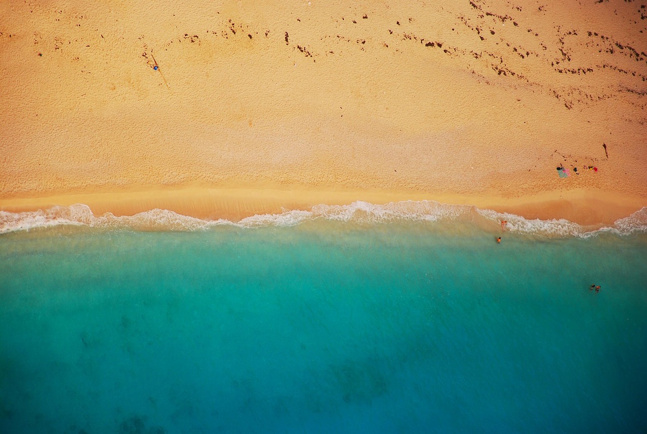 beach, shoreline, aerial view, bird's eye view, drone photography, coast, sea, ocean, waves, summer, shore, sand, vacation, water, nature, coastline, travel, seashore, holiday, landscape, tourism, seaside, people, tropical island, seascape, scenic, outdoors, relaxation, swimming, tranquil, tranquility, warmth, getaway, aerial, idyllic, relax, beach, beach, beach, beach, beach, sea, summer, summer, travel